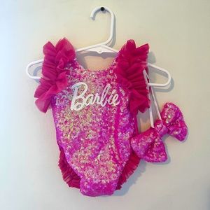 Barbie leotard with matching sequin bow. Newborn.